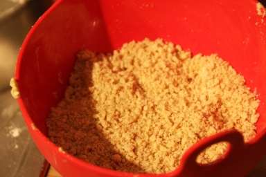 Bowl with mixture showing small even breadcrumb texture.